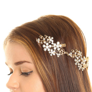 Travessão dourado daisy - Claire's: 14,99€